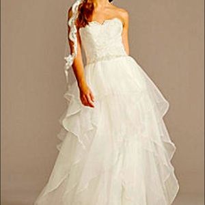 New in box wedding dress. Soft white.